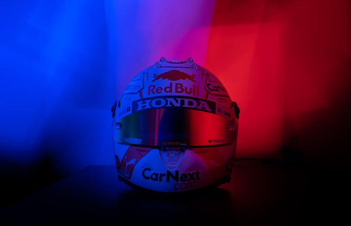 racing helmet in red and blue lighting