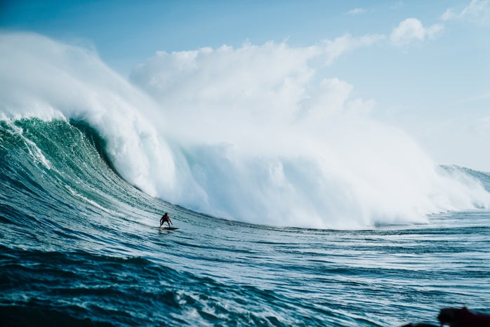 ocean wave surfing guy