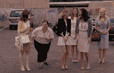 A gif of the cast of Bridesmaid running towards a location
