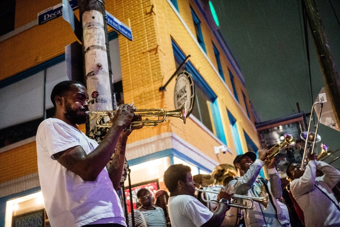 musicians on frenchman street new orleans by unsplash?width=698&height=466&fit=crop&auto=webp