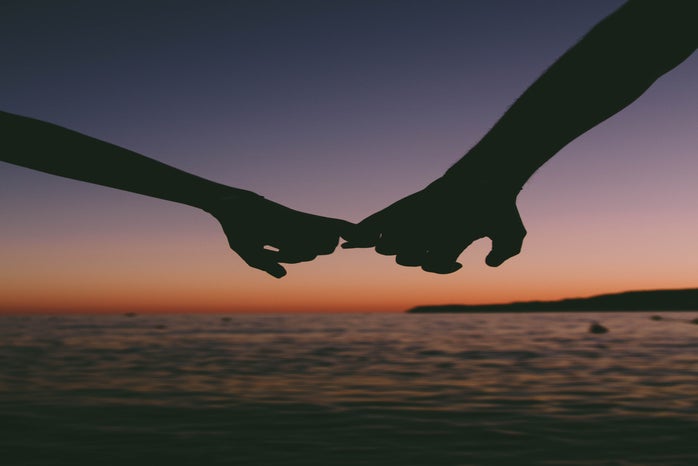 holding hands at sunset by Valentin Antonucci?width=698&height=466&fit=crop&auto=webp