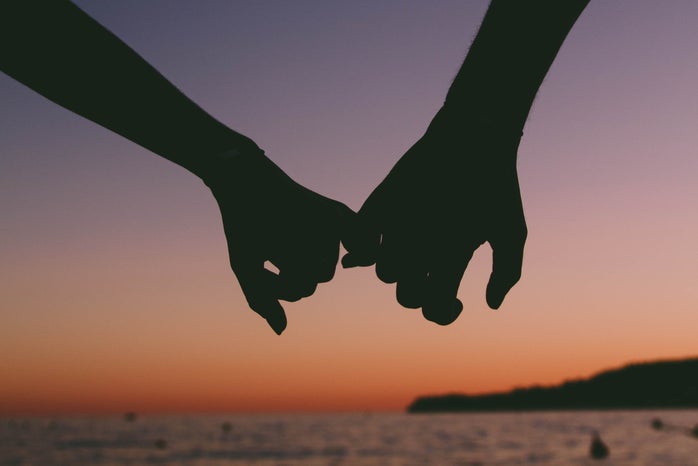 holding hands at sunset by Valentin Antonucci?width=698&height=466&fit=crop&auto=webp