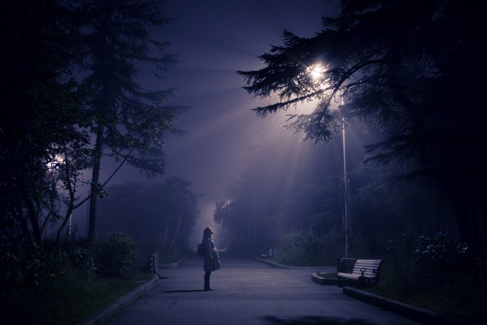 person looking at street lamp by Artem Kovalev?width=698&height=466&fit=crop&auto=webp