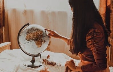 woman and a globe