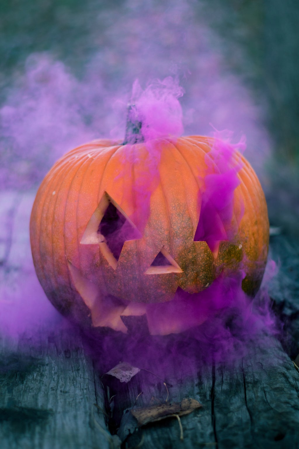 Pumpkin with purple smoke coming out of it (October DVAM is represented by the color purple)