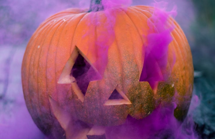 Pumpkin with purple smoke coming out of it (October DVAM is represented by the color purple)