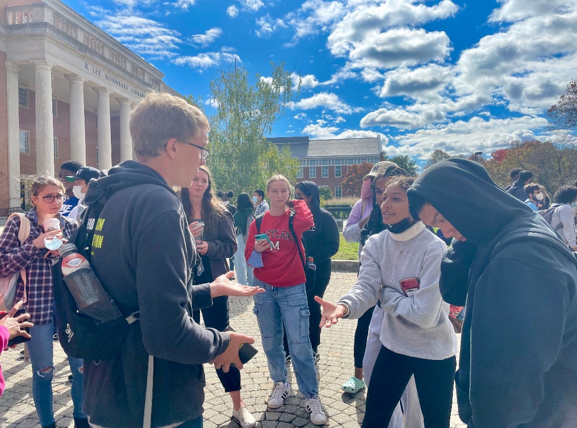 University of Maryland students arguing with an anti abortion protester on campus