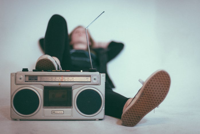 woman laying down with her foot on a radio by Eric Nopanen on Unsplash?width=698&height=466&fit=crop&auto=webp