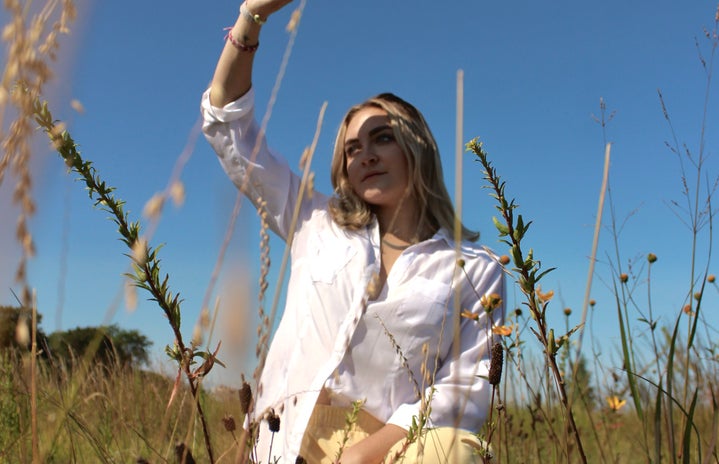 Girl in wildflower field