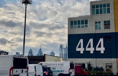 A building with big 444 on the side of it facing the camera