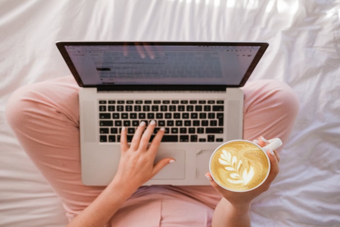 person holding coffee and typing on laptop by Sincerely MediaUnsplash?width=698&height=466&fit=crop&auto=webp
