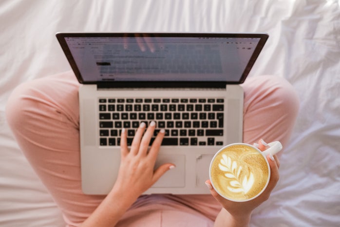 person holding coffee and typing on laptop by Sincerely MediaUnsplash?width=698&height=466&fit=crop&auto=webp