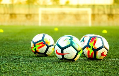 Soccer balls on a field