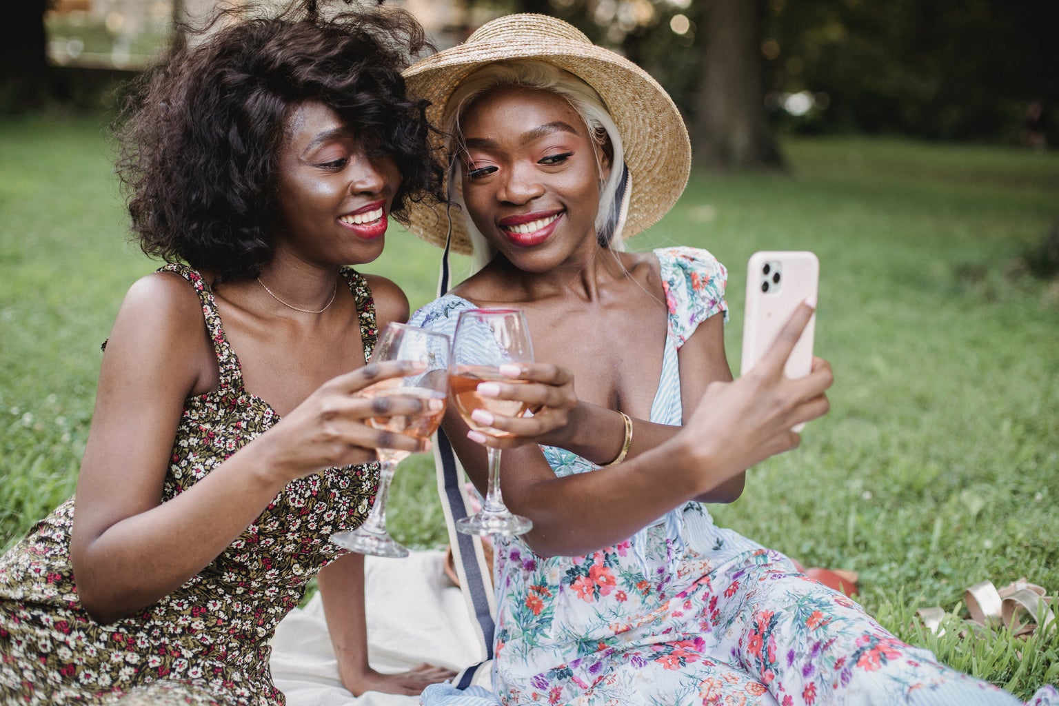 Women taking a selfie together.