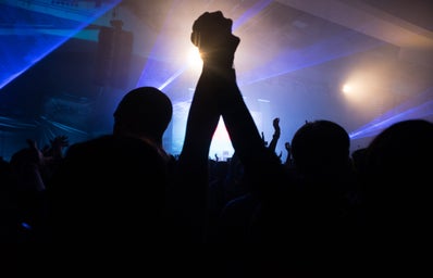 silhouette of couple in concert