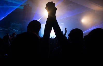 silhouette of couple in concert