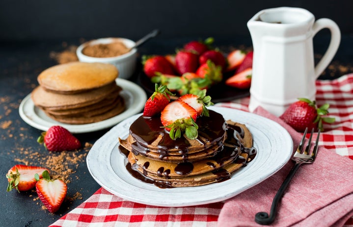 Chocolate pancakes with strawberries