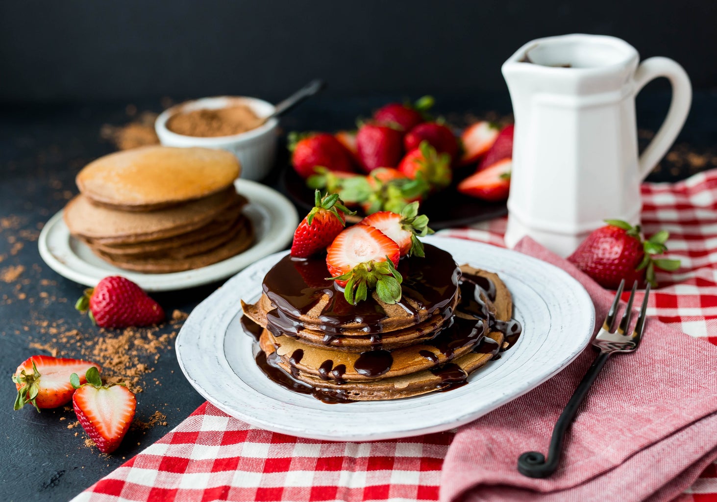 Chocolate pancakes with strawberries