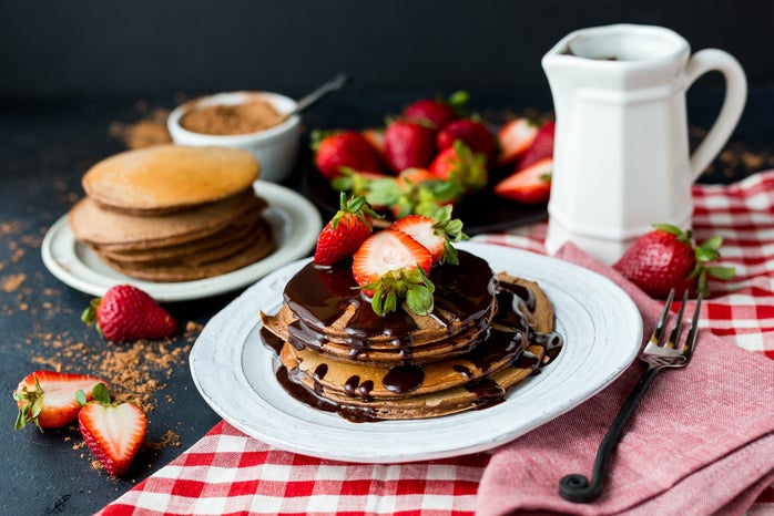 Chocolate pancakes with strawberries by Whitney Wright?width=698&height=466&fit=crop&auto=webp