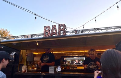 A picture of the small business, The Lucky Penny Bar. This business is woman owned and operated, and came to a local festival at the university.