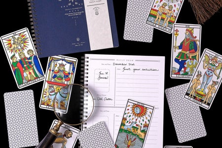 cards and stationary with magnifying glass