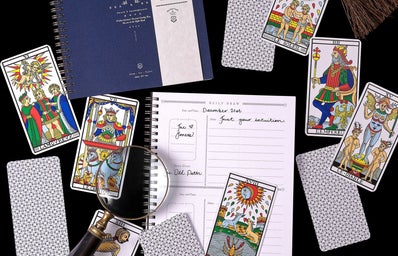 cards and stationary with magnifying glass