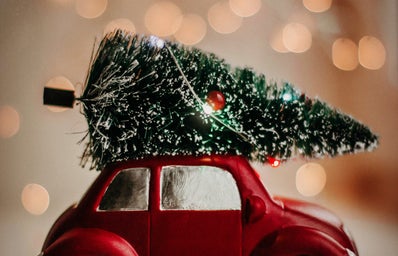 Christmas tree on red car