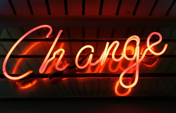 \'Change\' in an orange neon sign