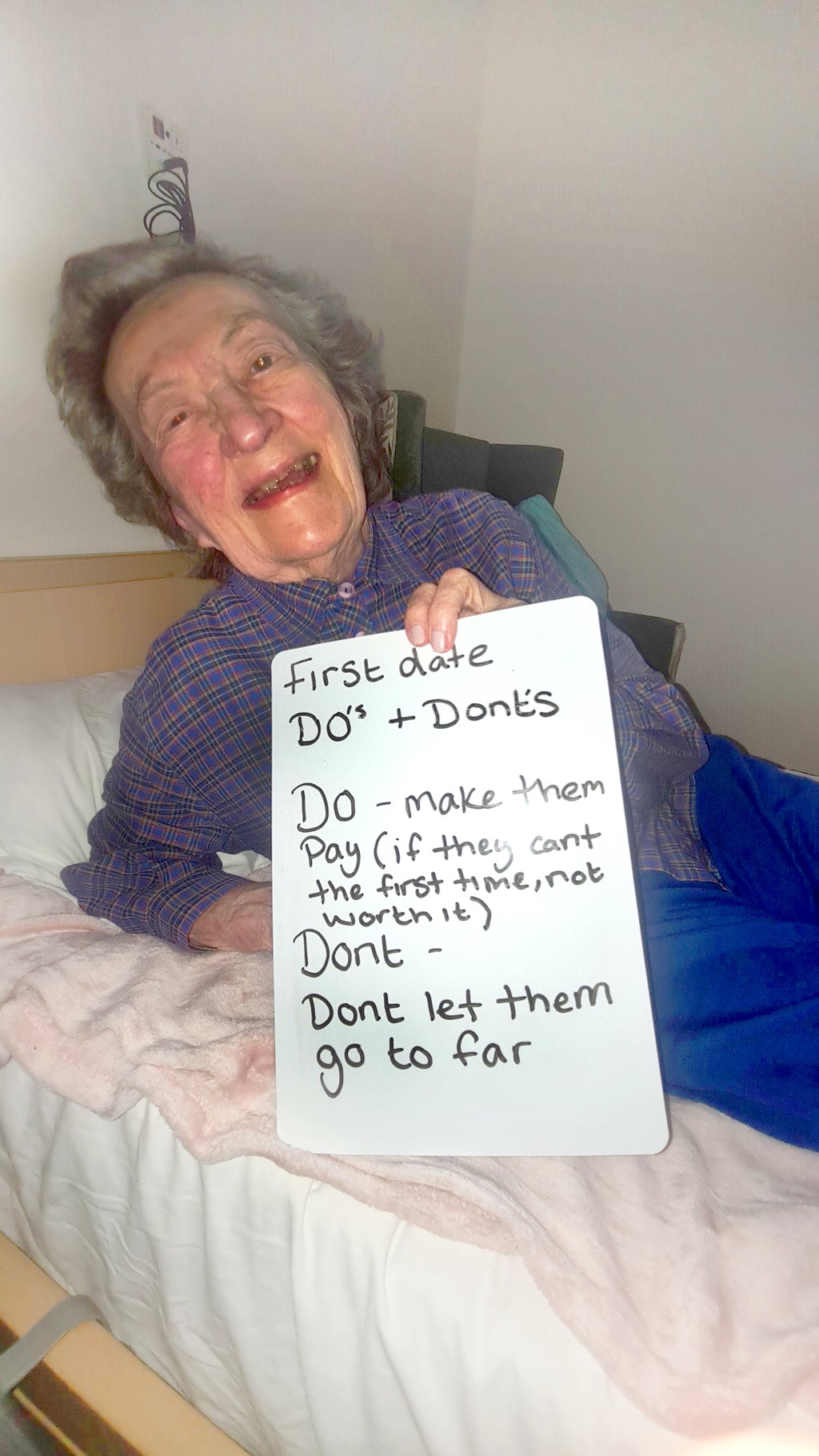 Elderly people holding signs with their dating tips