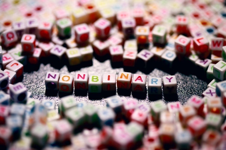 colored letters forming the word non-binary