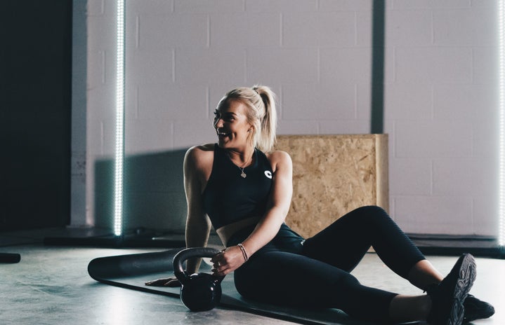 girl smiling in gym