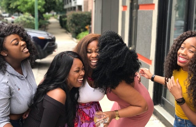 picture of three black women laughing together