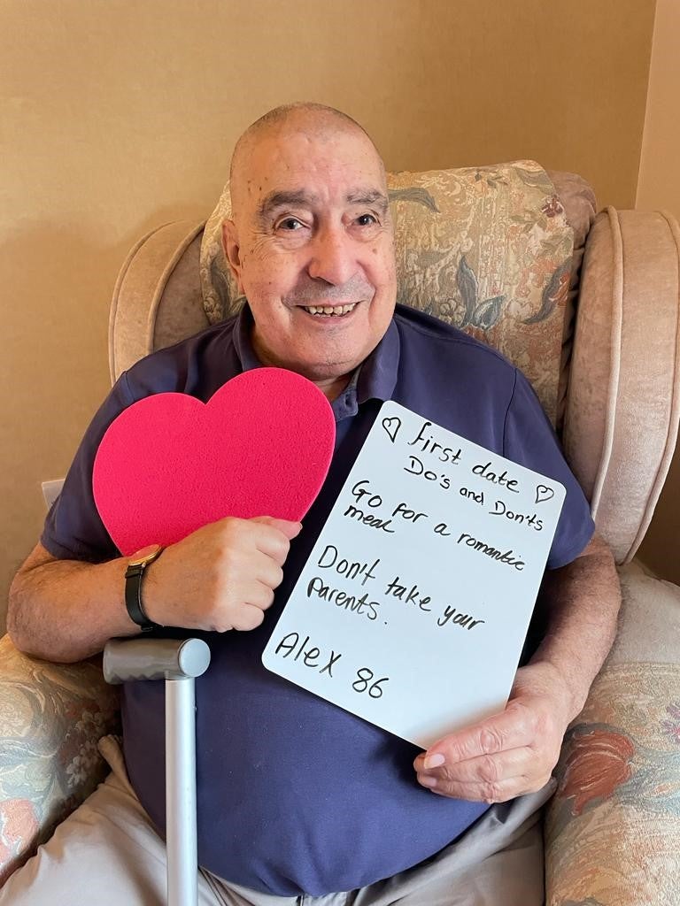 A selection of elderly people holding up their dating tip signs