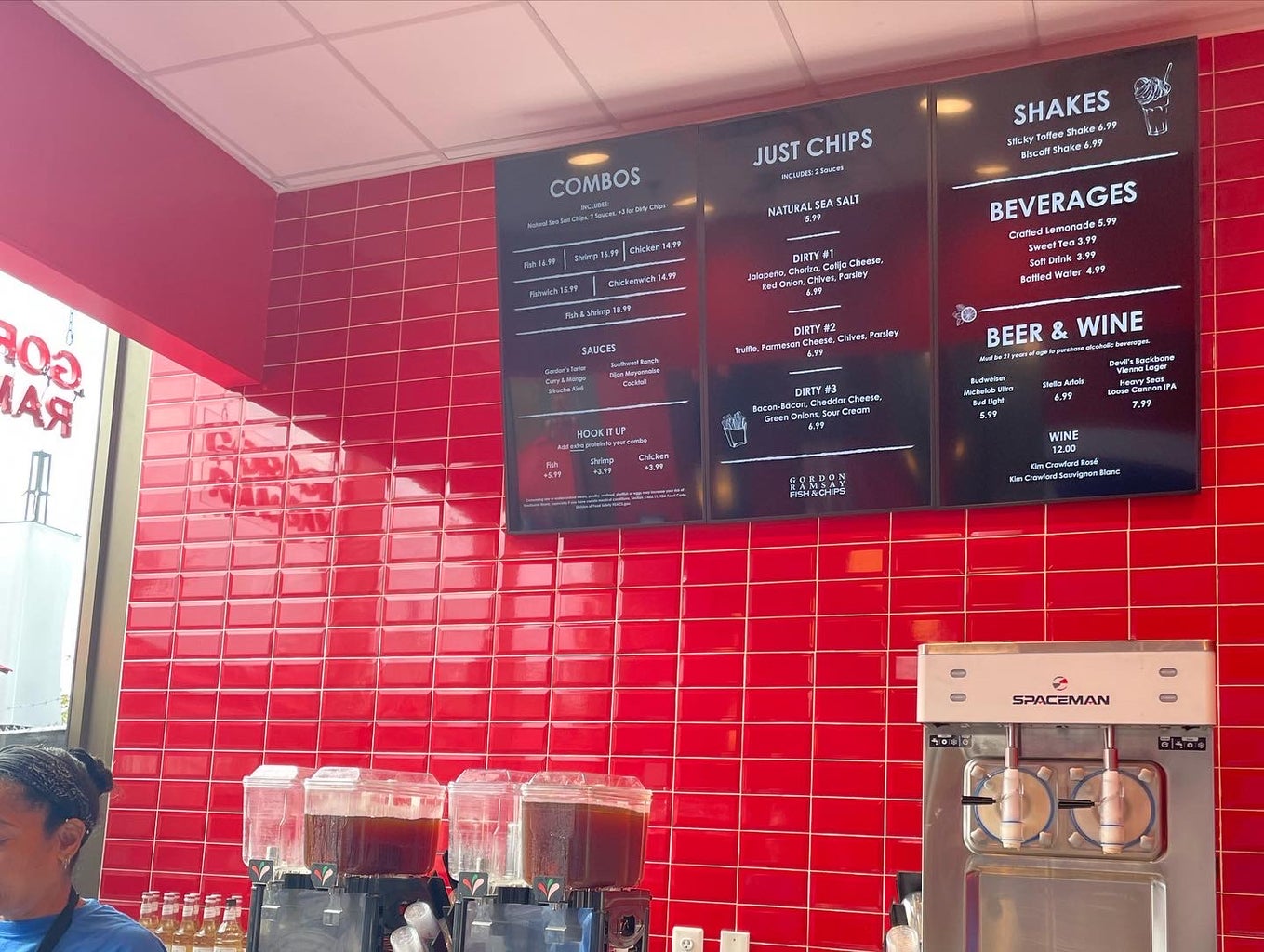 The menu board inside Gordan Ramsey\'s new fish and chip shop in the Warf D.C.
