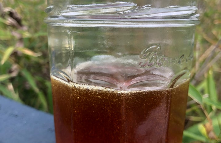 Sugar wax in a glass jar