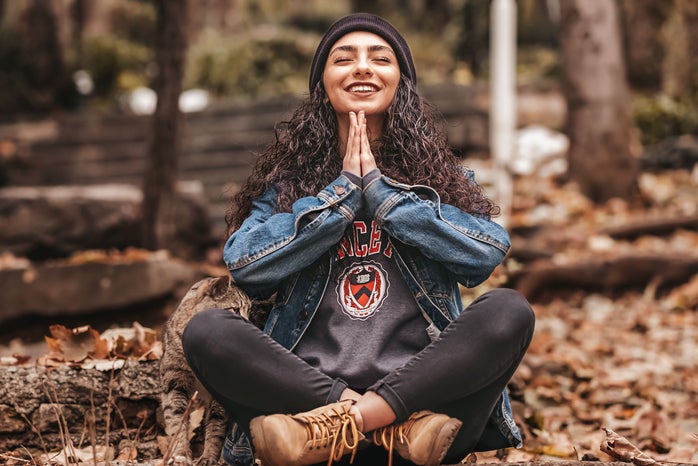 woman meditating outside