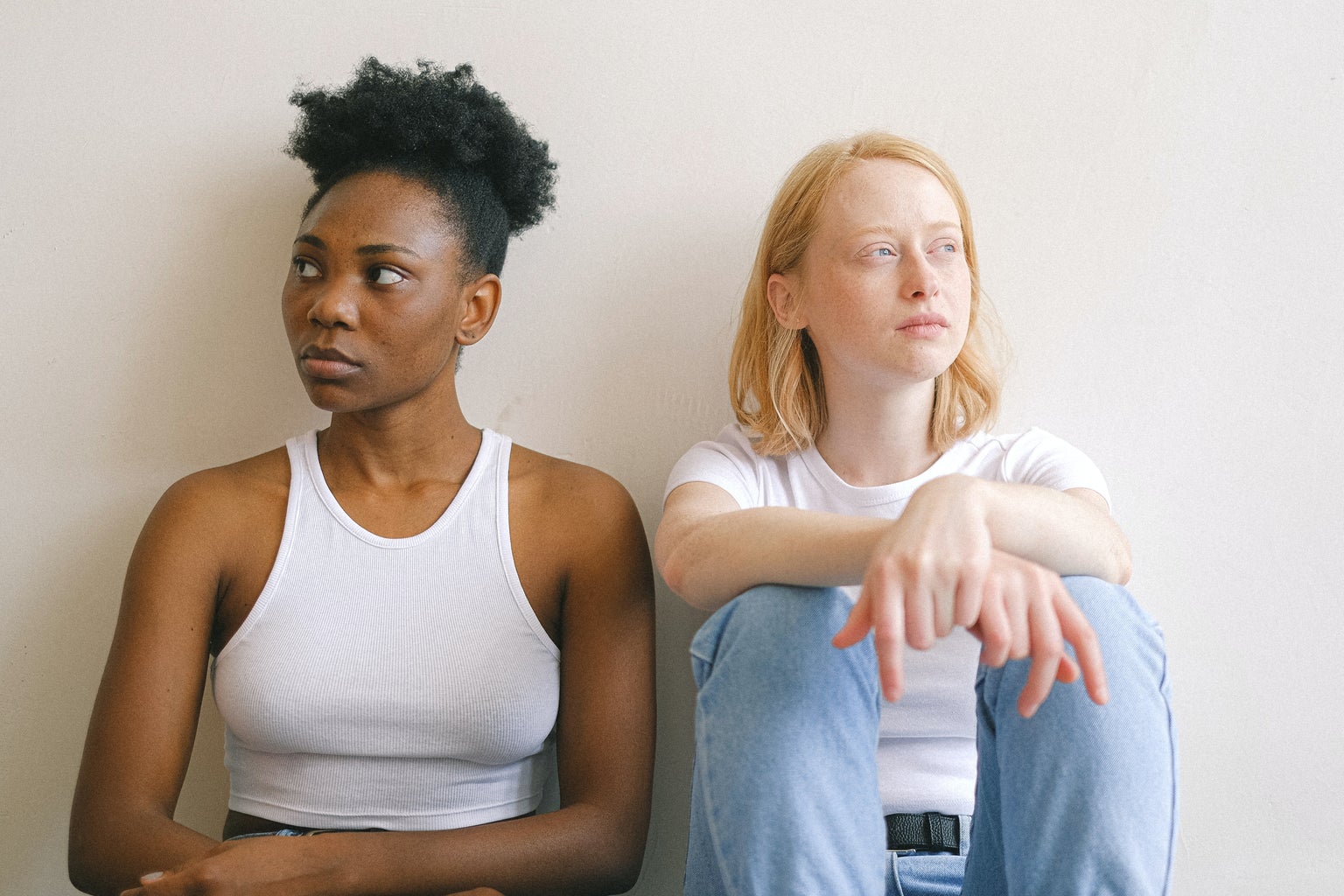 Women Sitting Close Together