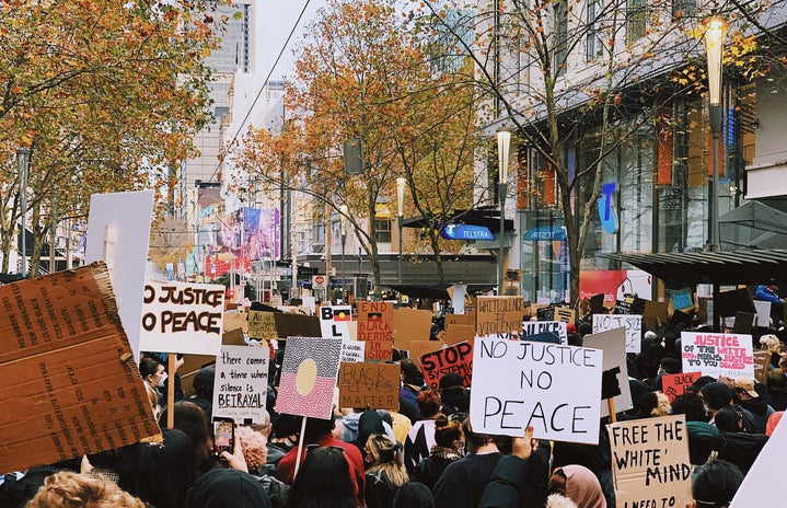 protest signs by Lennon Cheng via Unsplash?width=719&height=464&fit=crop&auto=webp