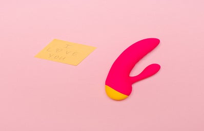 pink background with vibrator and sticky note saying I love you