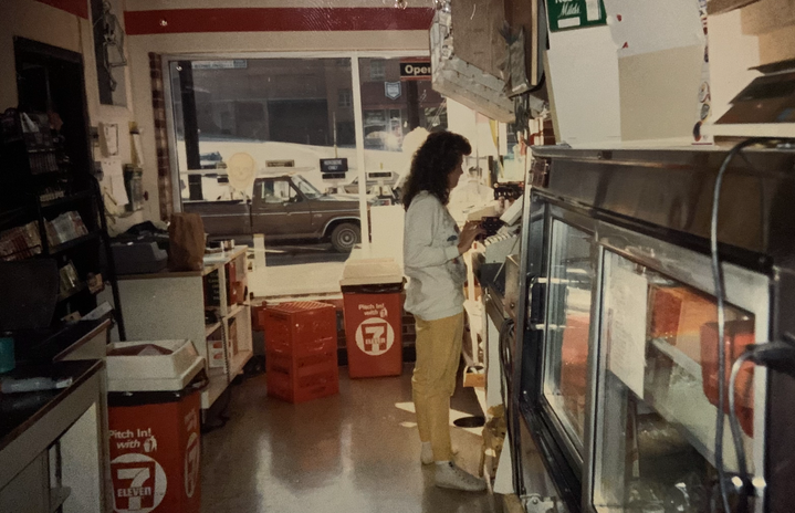 Vintage photo of woman working the register at 7-Eleven