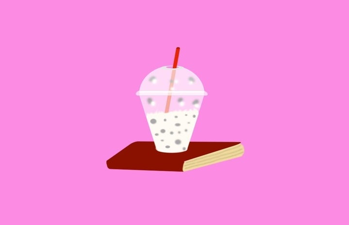 An illustration of a milkshake on top of a book.