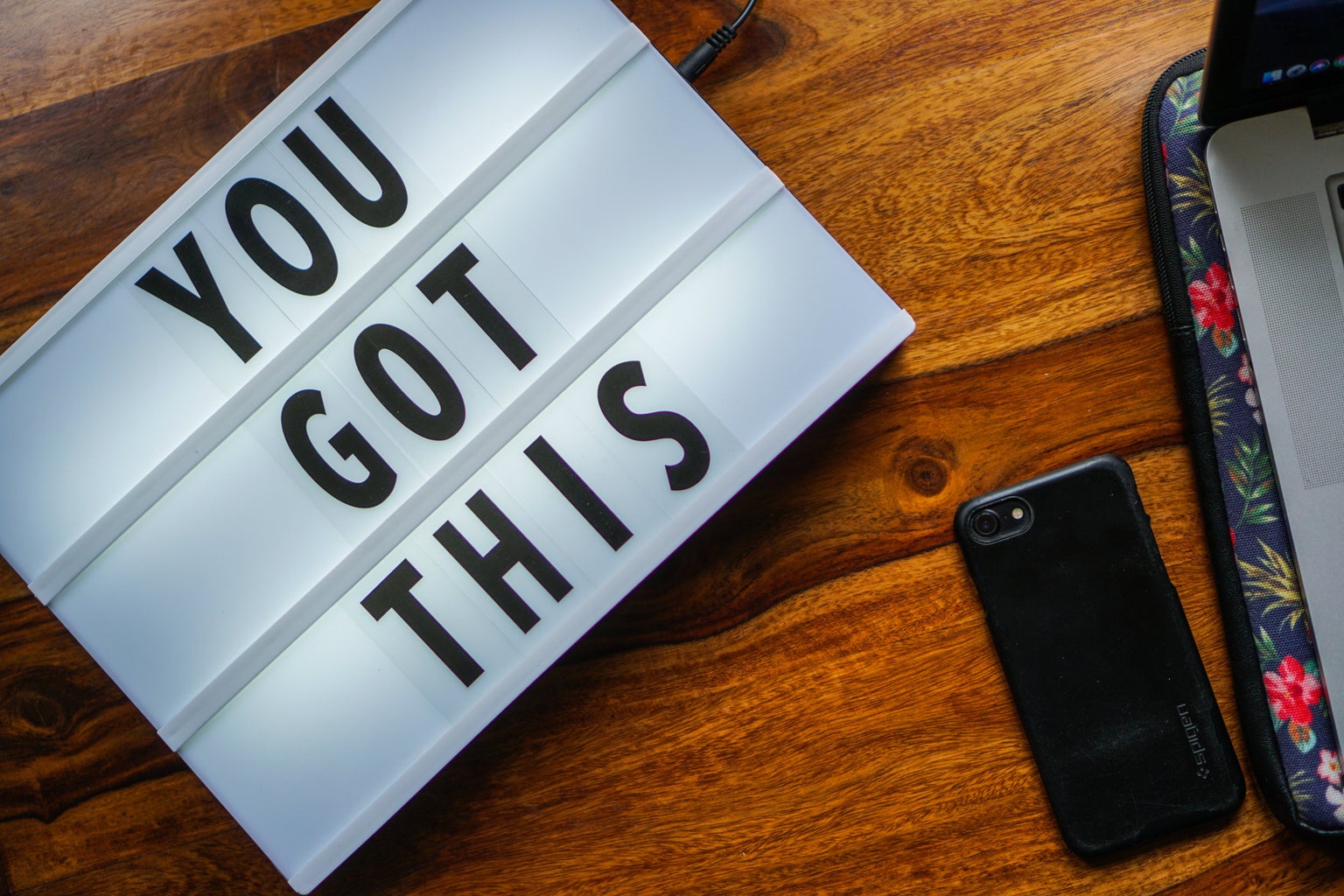 "You Got This" sign with iPhone next to it