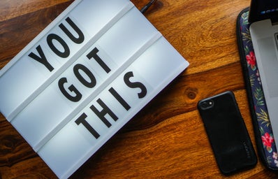 "You Got This" sign with iPhone next to it