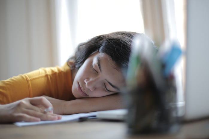 woman asleep while studying