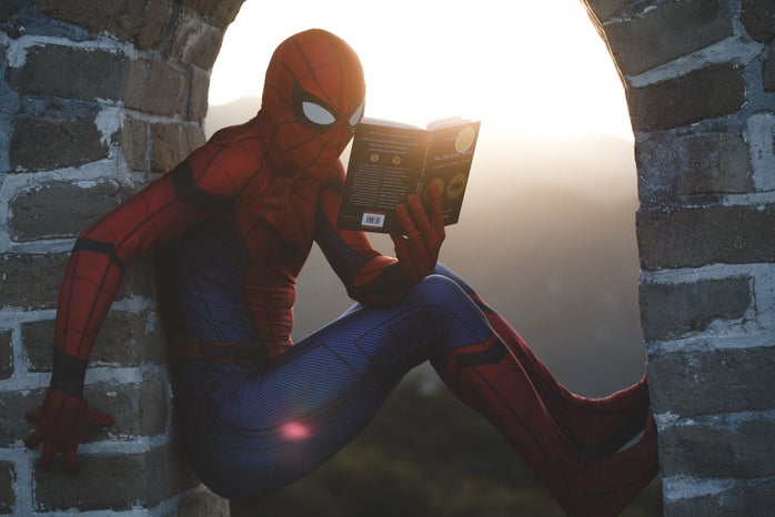 spider-man reading a book