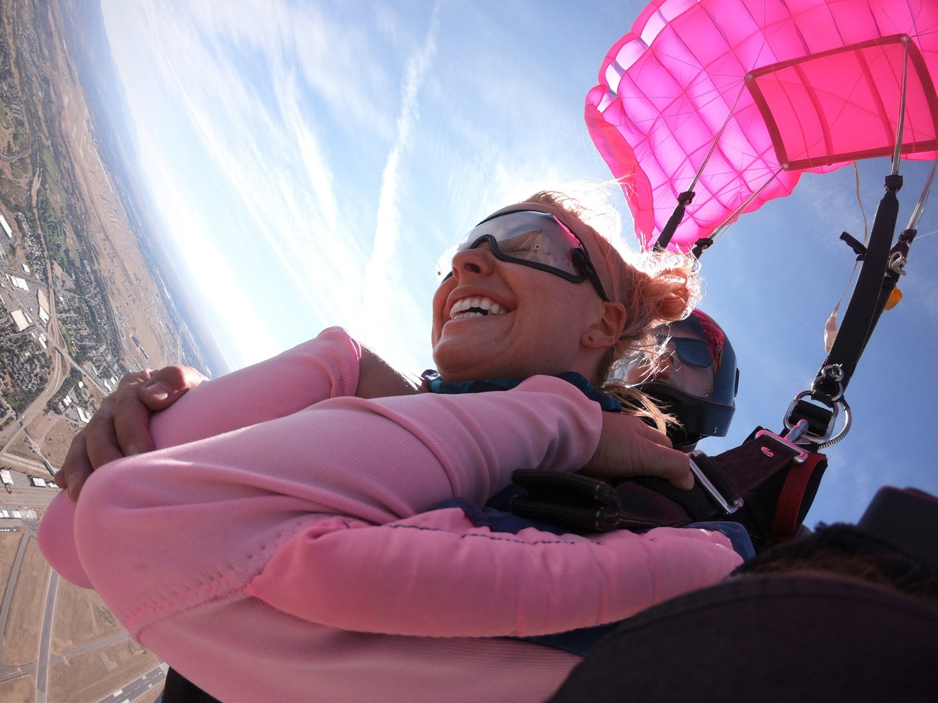 Madison Skydiving with her pink parachute