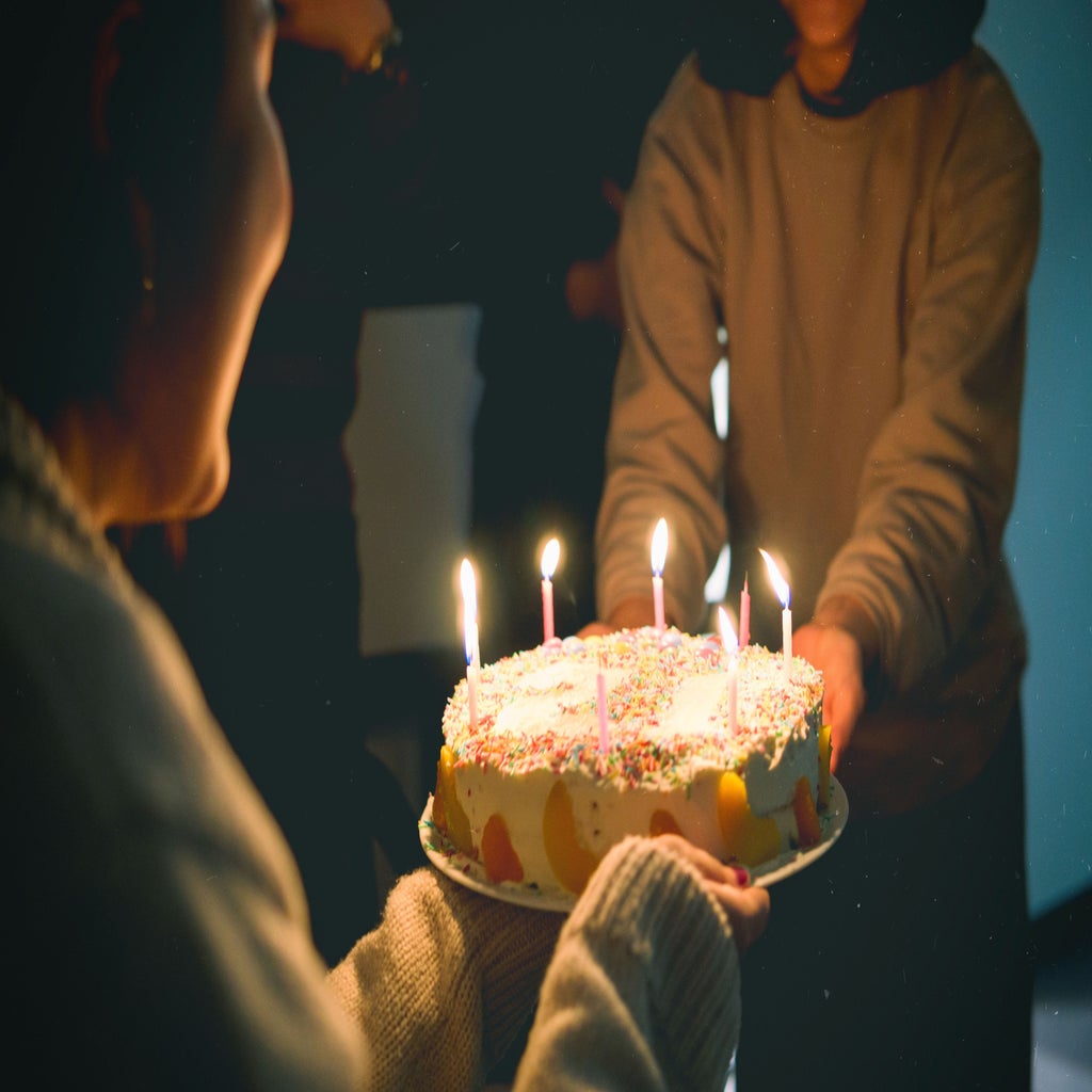 Cake with lit candles