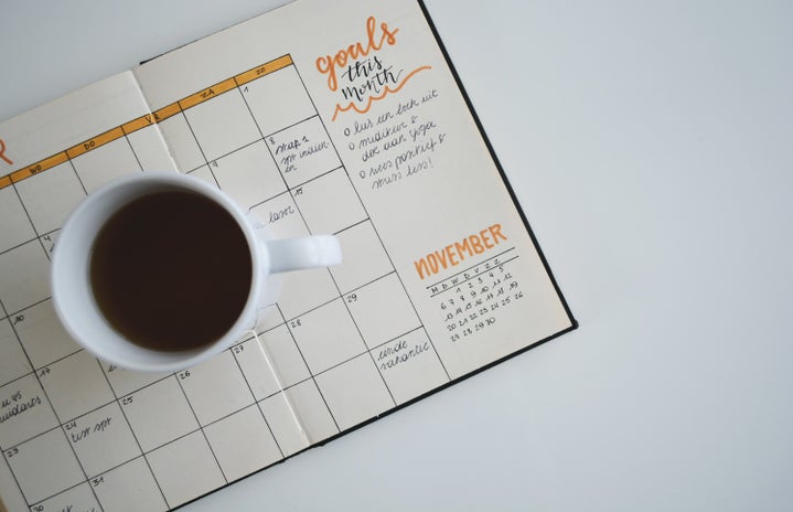 planner with coffee cup by Unsplash?width=719&height=464&fit=crop&auto=webp