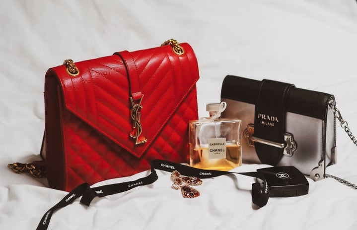 YSL and Prada purse with Chanel perfume by Laura Chouette?width=719&height=464&fit=crop&auto=webp