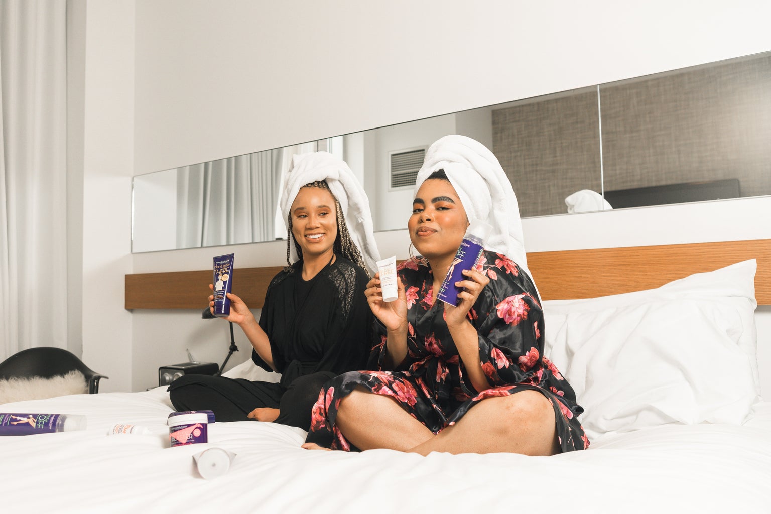 Spa day, two girls, robes, bedroom, bed, beauty products